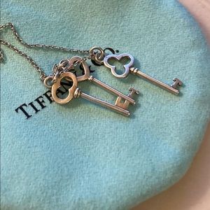 Tiffany and Co. Keys sterling silver gently used. Blue Tiffany’s pouch.